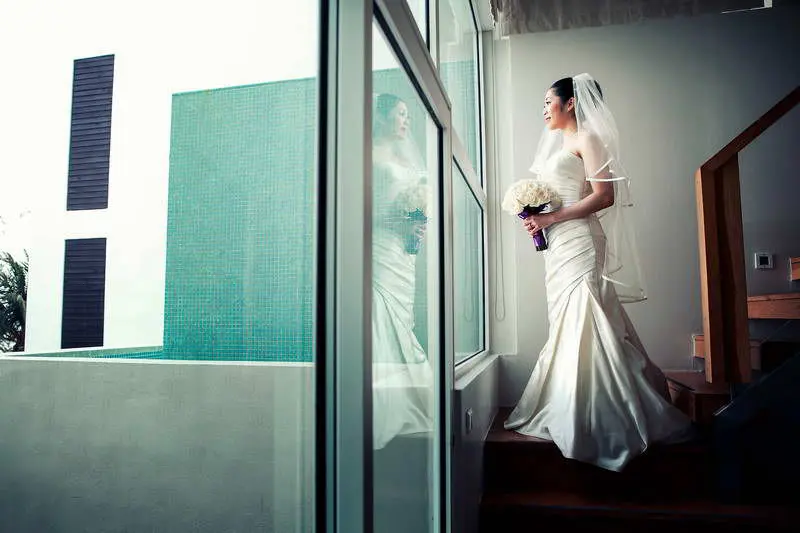 beautiful bride getting ready before her beach wedding ceremony