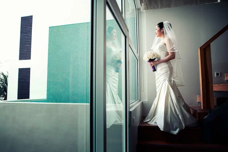 beautiful bride getting ready before her beach wedding ceremony